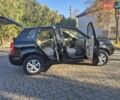 Чорний Хендай Туксон, об'ємом двигуна 2 л та пробігом 187 тис. км за 7900 $, фото 6 на Automoto.ua