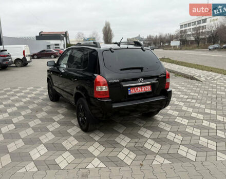 Черный Хендай Туксон, объемом двигателя 2 л и пробегом 191 тыс. км за 8500 $, фото 22 на Automoto.ua