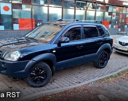 Черный Хендай Туксон, объемом двигателя 2 л и пробегом 240 тыс. км за 8700 $, фото 1 на Automoto.ua