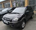 Черный Хендай Туксон, объемом двигателя 2 л и пробегом 237 тыс. км за 7500 $, фото 1 на Automoto.ua
