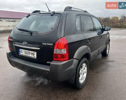 Хендай Туксон 2009 в Шостке на Automoto.ua Черный Хендай Туксон, объемом двигателя 1.98 л и пробегом 204 тыс. км за 9299 $, фото 9 на Automoto.ua