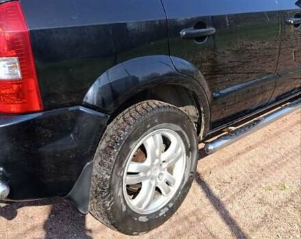 Черный Хендай Туксон, объемом двигателя 2 л и пробегом 226 тыс. км за 8700 $, фото 24 на Automoto.ua