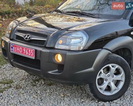 Хендай Туксон 2009 в Гусятине на Automoto.ua Черный Хендай Туксон, объемом двигателя 2 л и пробегом 143 тыс. км за 9700 $, фото 13 на Automoto.ua
