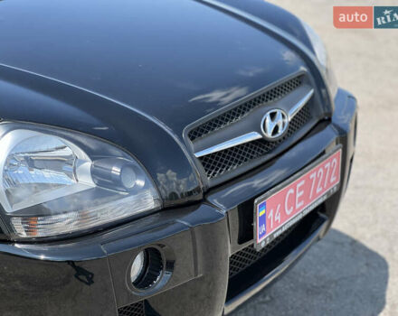 Чорний Хендай Туксон, об'ємом двигуна 2 л та пробігом 163 тис. км за 9199 $, фото 9 на Automoto.ua