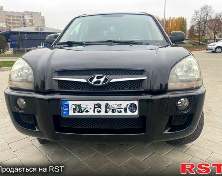 Черный Хендай Туксон, объемом двигателя 2 л и пробегом 168 тыс. км за 7700 $, фото 1 на Automoto.ua