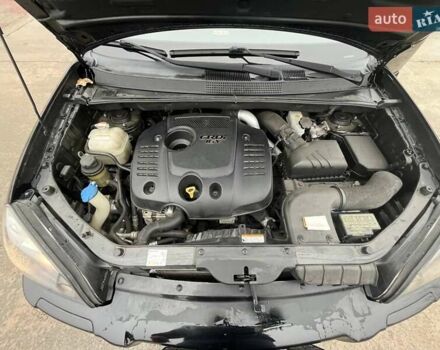 Черный Хендай Туксон, объемом двигателя 2 л и пробегом 128 тыс. км за 9200 $, фото 16 на Automoto.ua