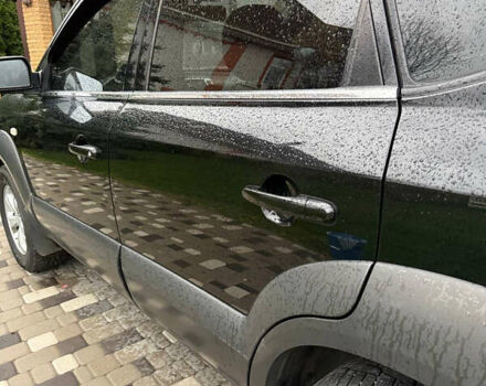 Черный Хендай Туксон, объемом двигателя 2.66 л и пробегом 205 тыс. км за 10000 $, фото 26 на Automoto.ua