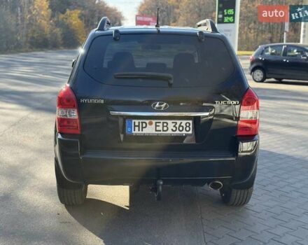 Черный Хендай Туксон, объемом двигателя 2 л и пробегом 148 тыс. км за 8700 $, фото 42 на Automoto.ua