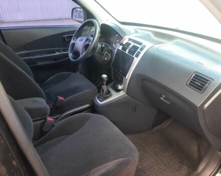 Чорний Хендай Туксон, об'ємом двигуна 2 л та пробігом 130 тис. км за 9200 $, фото 11 на Automoto.ua