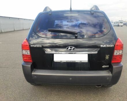Чорний Хендай Туксон, об'ємом двигуна 2 л та пробігом 130 тис. км за 9200 $, фото 4 на Automoto.ua