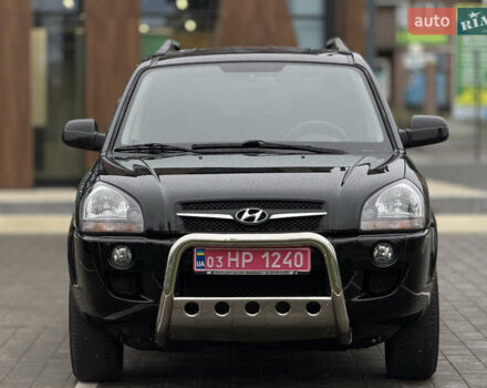 Черный Хендай Туксон, объемом двигателя 1.98 л и пробегом 202 тыс. км за 7650 $, фото 3 на Automoto.ua
