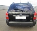 Чорний Хендай Туксон, об'ємом двигуна 2 л та пробігом 130 тис. км за 9200 $, фото 4 на Automoto.ua