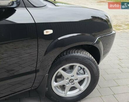 Чорний Хендай Туксон, об'ємом двигуна 2 л та пробігом 93 тис. км за 9750 $, фото 25 на Automoto.ua