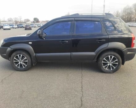 Чорний Хендай Туксон, об'ємом двигуна 2 л та пробігом 130 тис. км за 9200 $, фото 6 на Automoto.ua