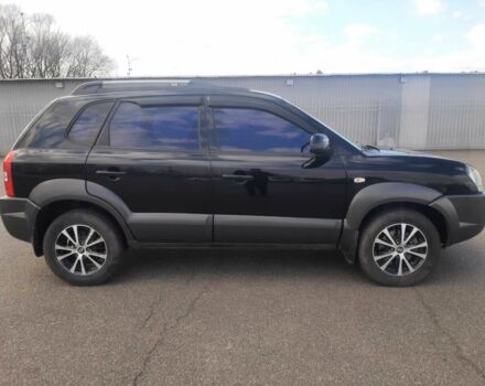 Чорний Хендай Туксон, об'ємом двигуна 2 л та пробігом 130 тис. км за 9200 $, фото 2 на Automoto.ua