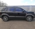 Чорний Хендай Туксон, об'ємом двигуна 2 л та пробігом 130 тис. км за 9200 $, фото 2 на Automoto.ua