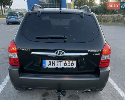 Чорний Хендай Туксон, об'ємом двигуна 2 л та пробігом 185 тис. км за 7783 $, фото 1 на Automoto.ua