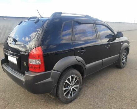 Чорний Хендай Туксон, об'ємом двигуна 2 л та пробігом 130 тис. км за 9200 $, фото 3 на Automoto.ua