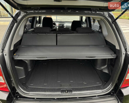 Черный Хендай Туксон, объемом двигателя 1.98 л и пробегом 202 тыс. км за 7650 $, фото 15 на Automoto.ua