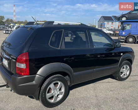 Чорний Хендай Туксон, об'ємом двигуна 2 л та пробігом 185 тис. км за 7783 $, фото 12 на Automoto.ua