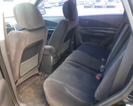 Чорний Хендай Туксон, об'ємом двигуна 2 л та пробігом 130 тис. км за 9200 $, фото 9 на Automoto.ua