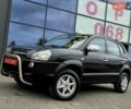 Чорний Хендай Туксон, об'ємом двигуна 2 л та пробігом 93 тис. км за 9750 $, фото 1 на Automoto.ua