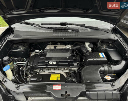 Черный Хендай Туксон, объемом двигателя 1.98 л и пробегом 202 тыс. км за 7650 $, фото 16 на Automoto.ua