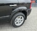 Чорний Хендай Туксон, об'ємом двигуна 2 л та пробігом 93 тис. км за 9750 $, фото 18 на Automoto.ua