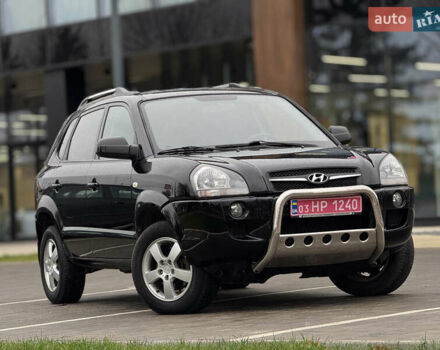 Черный Хендай Туксон, объемом двигателя 1.98 л и пробегом 202 тыс. км за 7650 $, фото 5 на Automoto.ua