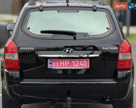 Черный Хендай Туксон, объемом двигателя 1.98 л и пробегом 202 тыс. км за 7650 $, фото 8 на Automoto.ua