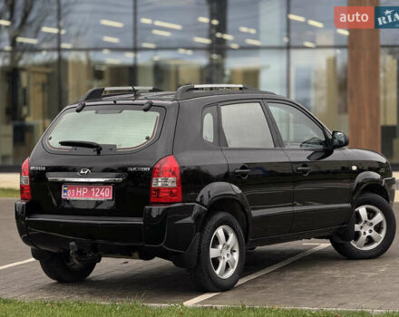 Черный Хендай Туксон, объемом двигателя 1.98 л и пробегом 202 тыс. км за 7650 $, фото 9 на Automoto.ua