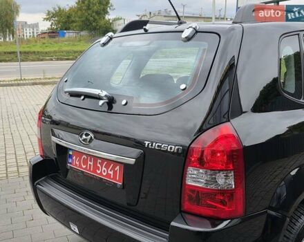 Чорний Хендай Туксон, об'ємом двигуна 2 л та пробігом 93 тис. км за 9750 $, фото 30 на Automoto.ua