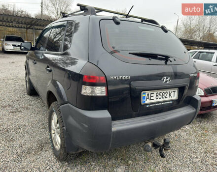 Черный Хендай Туксон, объемом двигателя 2 л и пробегом 175 тыс. км за 8000 $, фото 2 на Automoto.ua