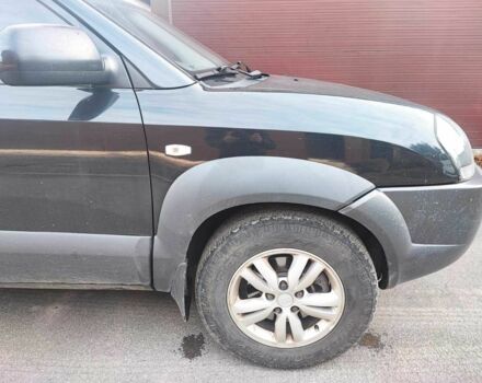 Чорний Хендай Туксон, об'ємом двигуна 2 л та пробігом 387 тис. км за 7000 $, фото 4 на Automoto.ua