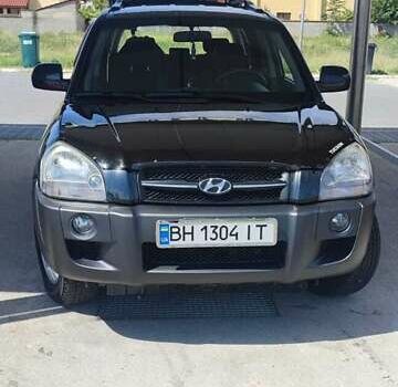 Черный Хендай Туксон, объемом двигателя 2 л и пробегом 141 тыс. км за 8500 $, фото 4 на Automoto.ua