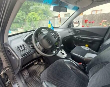 Чорний Хендай Туксон, об'ємом двигуна 1.98 л та пробігом 253 тис. км за 8500 $, фото 4 на Automoto.ua