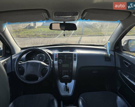 Черный Хендай Туксон, объемом двигателя 1.98 л и пробегом 218 тыс. км за 9350 $, фото 16 на Automoto.ua