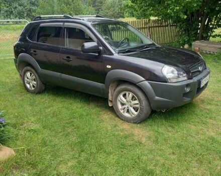 Черный Хендай Туксон, объемом двигателя 1.98 л и пробегом 220 тыс. км за 8500 $, фото 1 на Automoto.ua