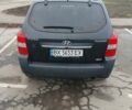 Черный Хендай Туксон, объемом двигателя 1.98 л и пробегом 214 тыс. км за 9100 $, фото 8 на Automoto.ua