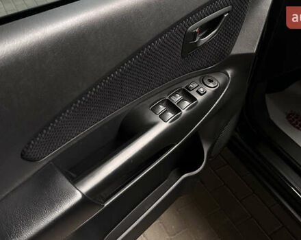 Черный Хендай Туксон, объемом двигателя 1.98 л и пробегом 129 тыс. км за 10600 $, фото 9 на Automoto.ua