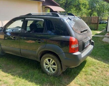 Черный Хендай Туксон, объемом двигателя 1.98 л и пробегом 220 тыс. км за 8500 $, фото 4 на Automoto.ua