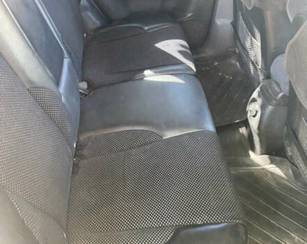 Черный Хендай Туксон, объемом двигателя 1.98 л и пробегом 245 тыс. км за 9000 $, фото 6 на Automoto.ua