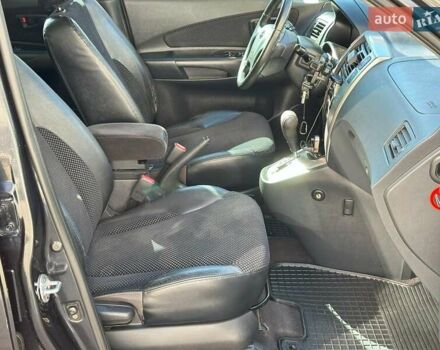 Черный Хендай Туксон, объемом двигателя 2 л и пробегом 255 тыс. км за 9290 $, фото 20 на Automoto.ua