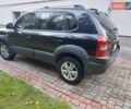 Черный Хендай Туксон, объемом двигателя 1.98 л и пробегом 125 тыс. км за 9200 $, фото 5 на Automoto.ua
