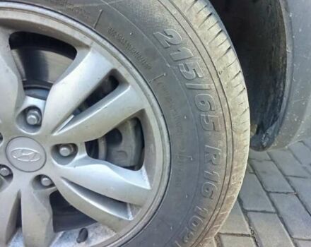 Черный Хендай Туксон, объемом двигателя 1.98 л и пробегом 298 тыс. км за 9300 $, фото 14 на Automoto.ua