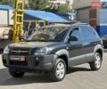 Черный Хендай Туксон, объемом двигателя 2 л и пробегом 255 тыс. км за 9290 $, фото 1 на Automoto.ua