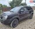 Чорний Хендай Туксон, об'ємом двигуна 1.98 л та пробігом 253 тис. км за 8500 $, фото 1 на Automoto.ua