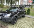 Черный Хендай Туксон, объемом двигателя 1.98 л и пробегом 312 тыс. км за 8500 $, фото 4 на Automoto.ua