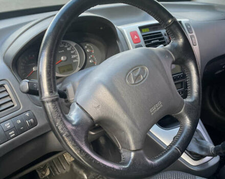 Чорний Хендай Туксон, об'ємом двигуна 1.98 л та пробігом 180 тис. км за 7950 $, фото 13 на Automoto.ua