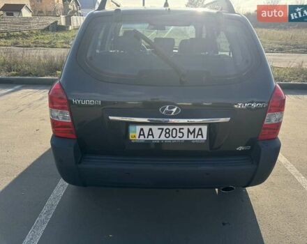 Черный Хендай Туксон, объемом двигателя 1.98 л и пробегом 218 тыс. км за 9350 $, фото 3 на Automoto.ua